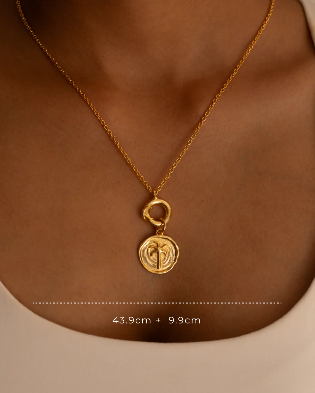 minimal charm pendant with palm tree motif in gold plated